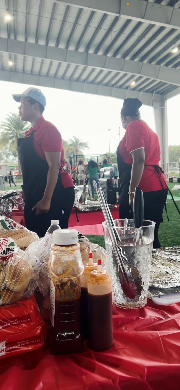 Flavorful Fusion team serving at an event